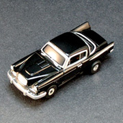 ThunderJet Ultra G Black 1957 Studebaker Golden Hawk Release 4 No 22 001184 Auto World HO Scale Slot Car