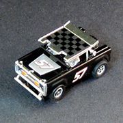 Ford Baja Bronco Black X-Traction Flamethrowers Release 4 RD122J HO Scale slot car